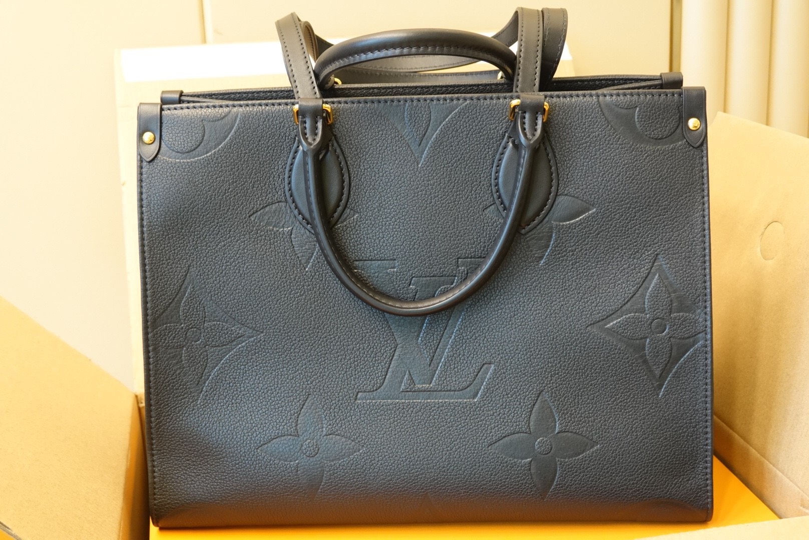 Onthego PM Monogram Empreinte Leather  Women  Handbags  LOUIS VUITTON 