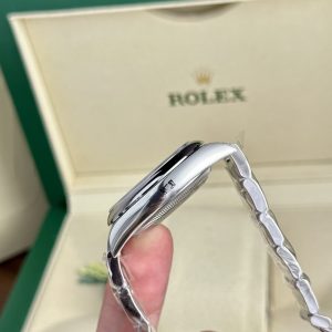 Đồng Hồ Rolex Oyster Perpetual 126000 Mặt Xanh Ngọc Lam Họa Tiết Celebration 36mm (1)